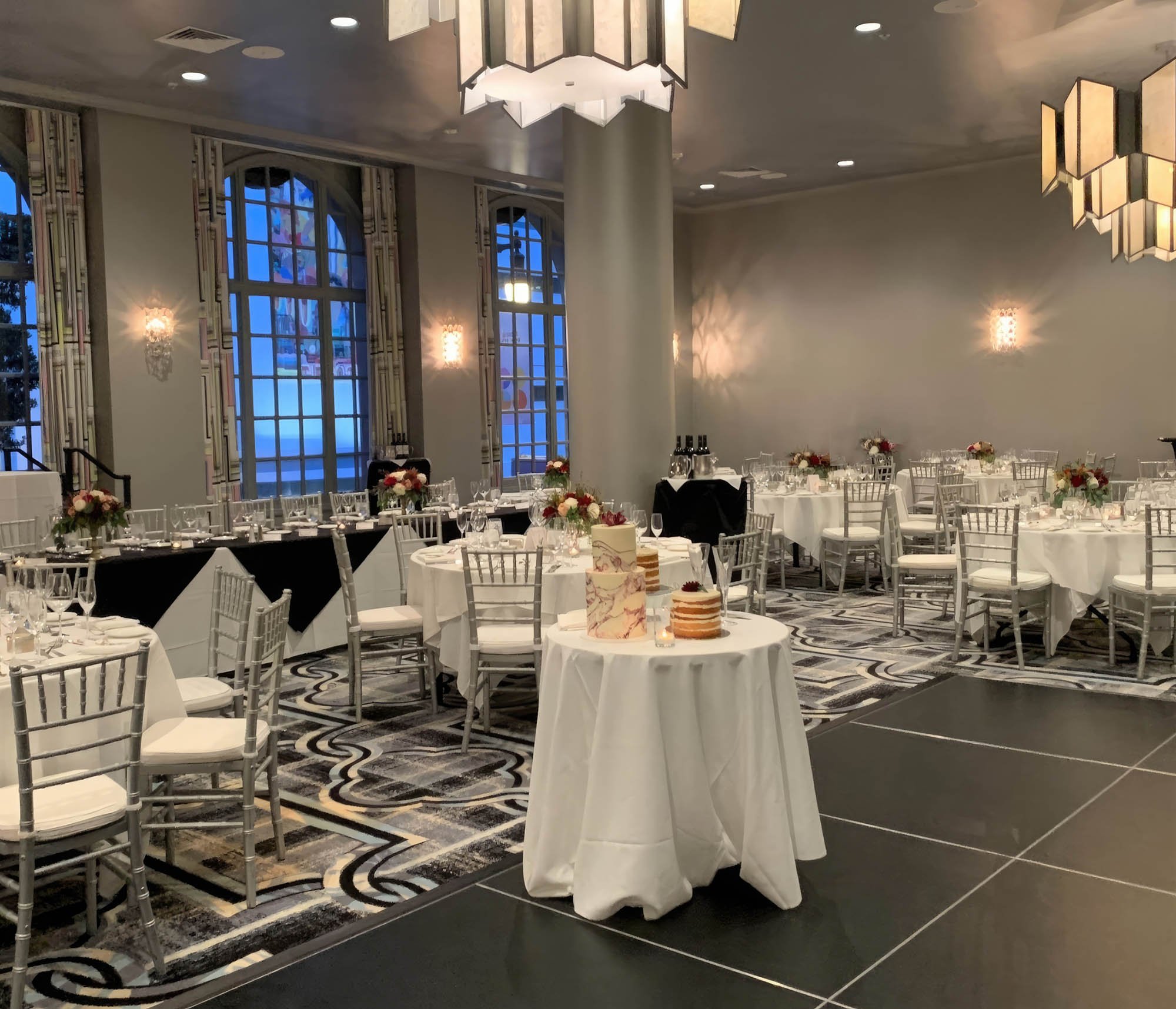 Tabels and chairs set up for a event in the Bellevue ball room at The Marker