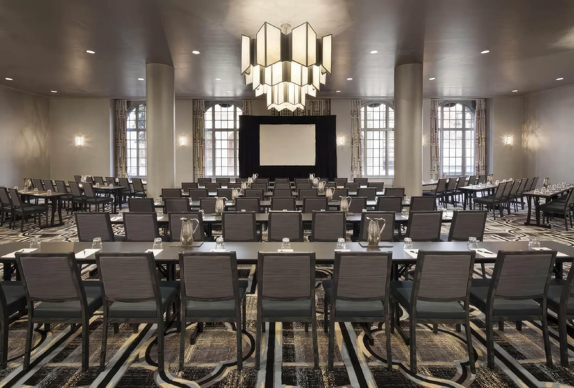 Rows of chairs and tables set up in the Bellevue meeting room at The Marker