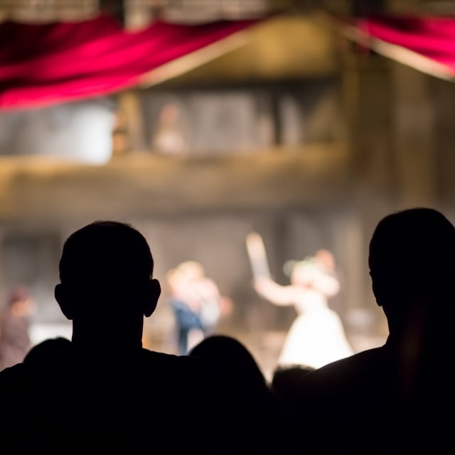 silhouettes of people enjoying a play at the golden gate theatre