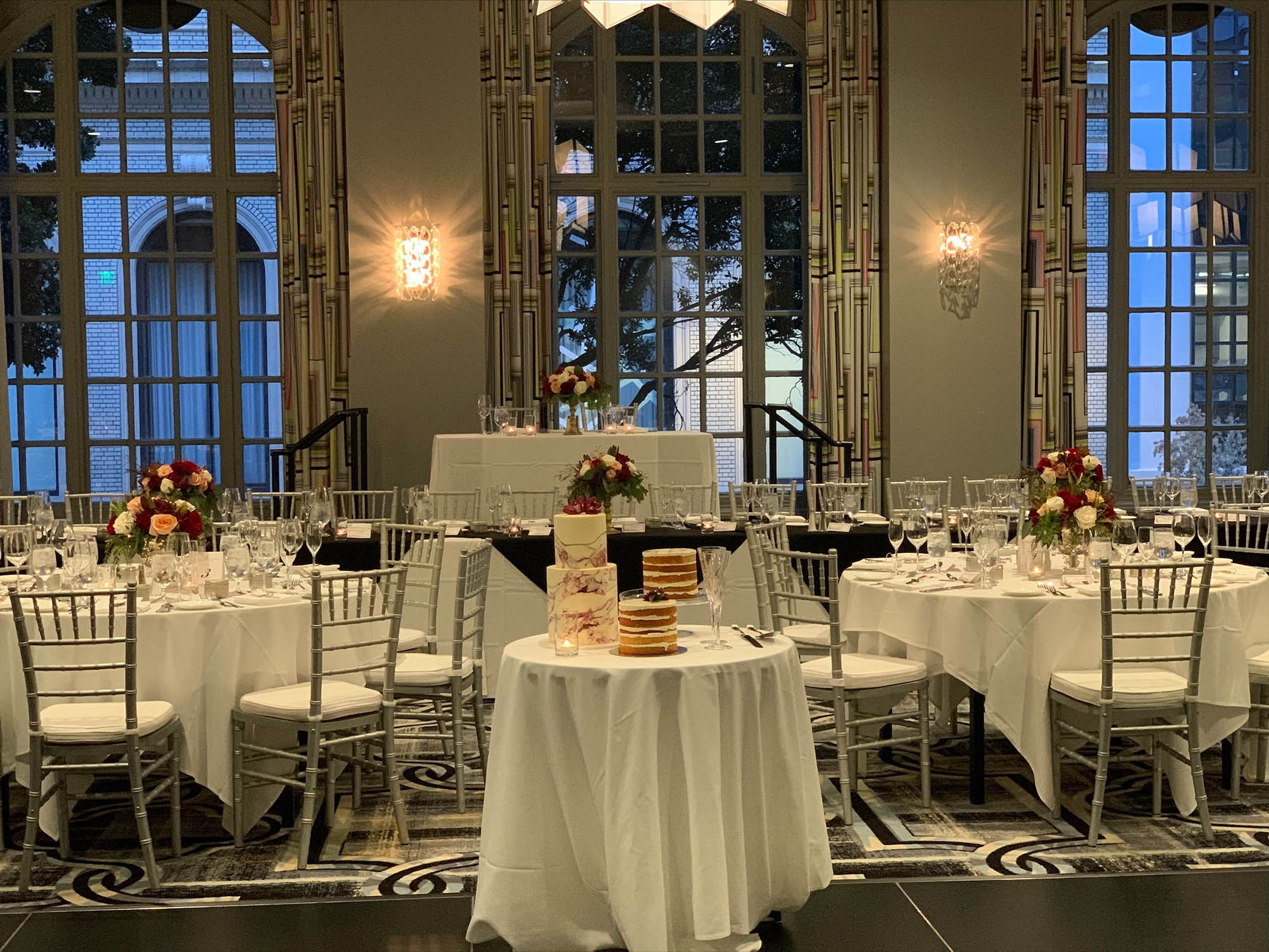 Sweetheart tables and head table set up for a wedding at The Marker