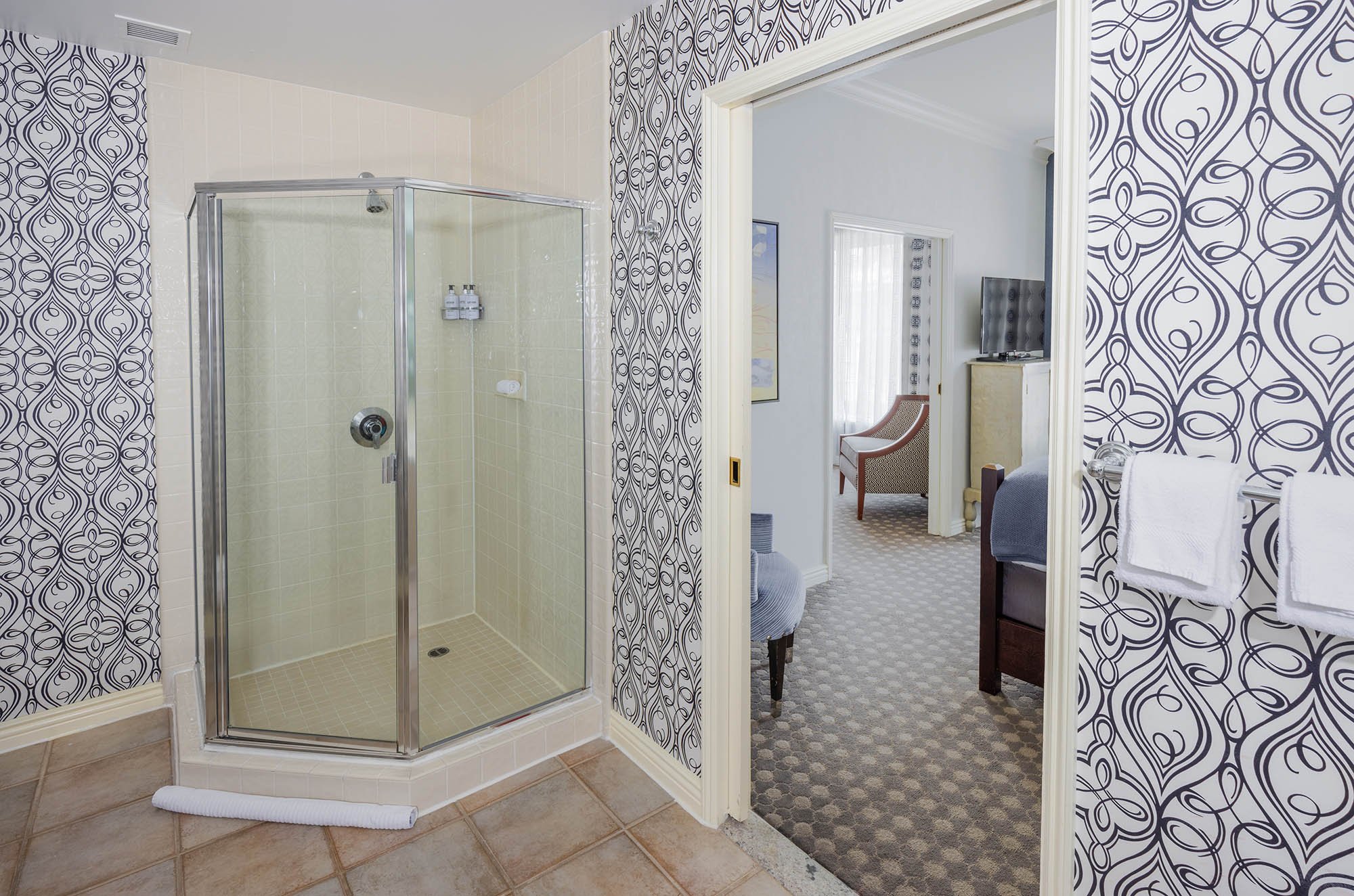 the bathroom and entrance to bedroom in a room at The Marker