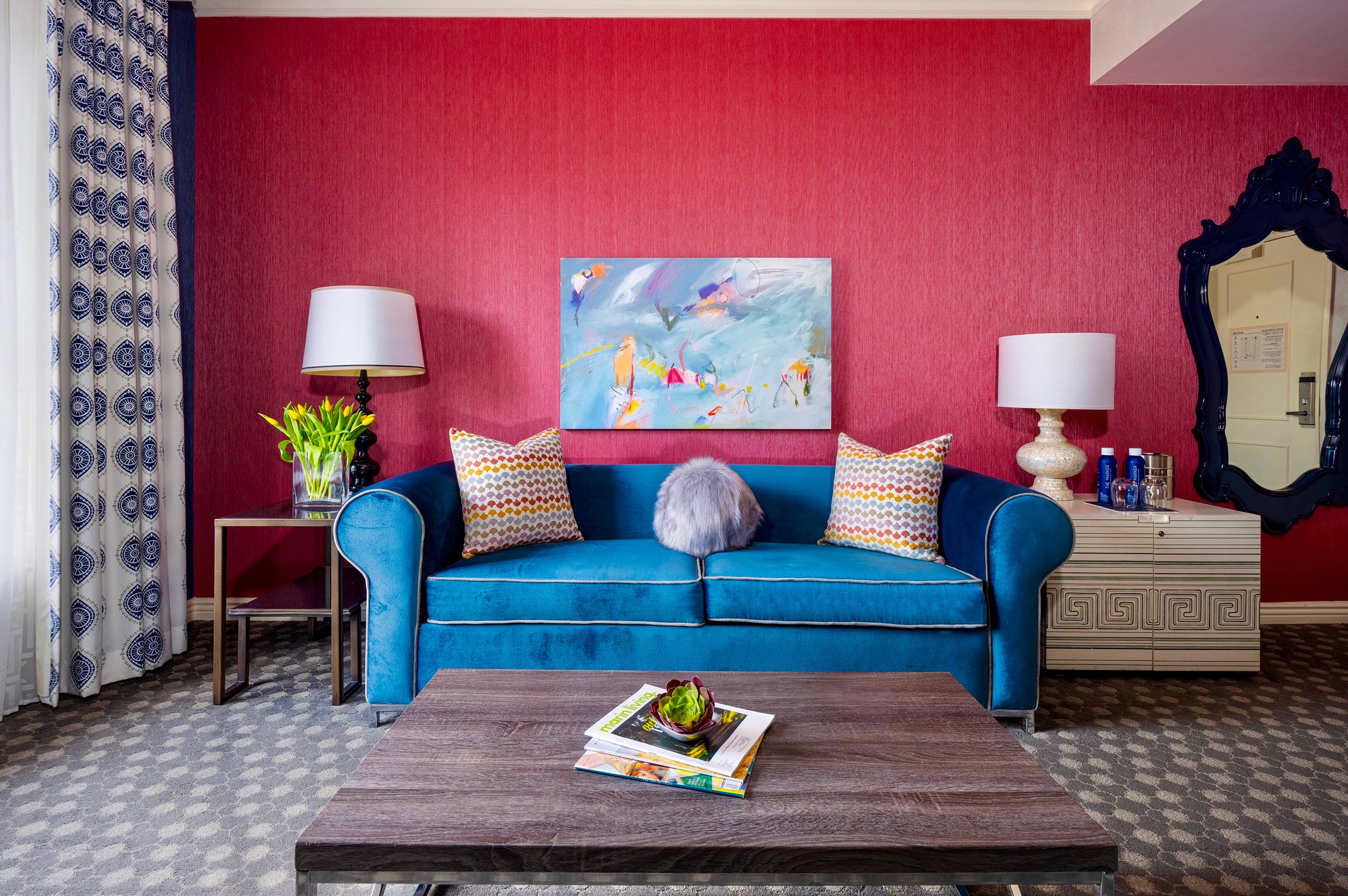 A blue sofa in a room at The Marker